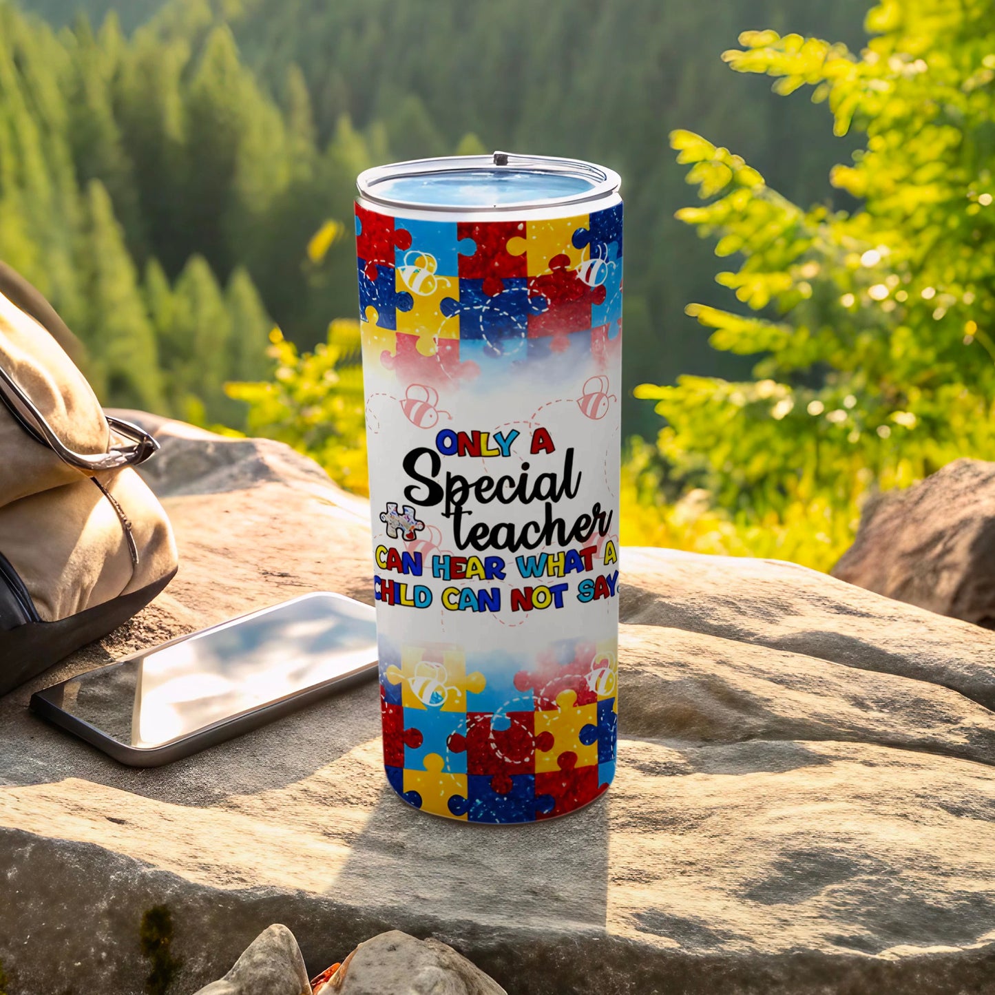 Tumbler with colorful puzzle pieces and text "Only a Special Teacher can hear what a child can not say".