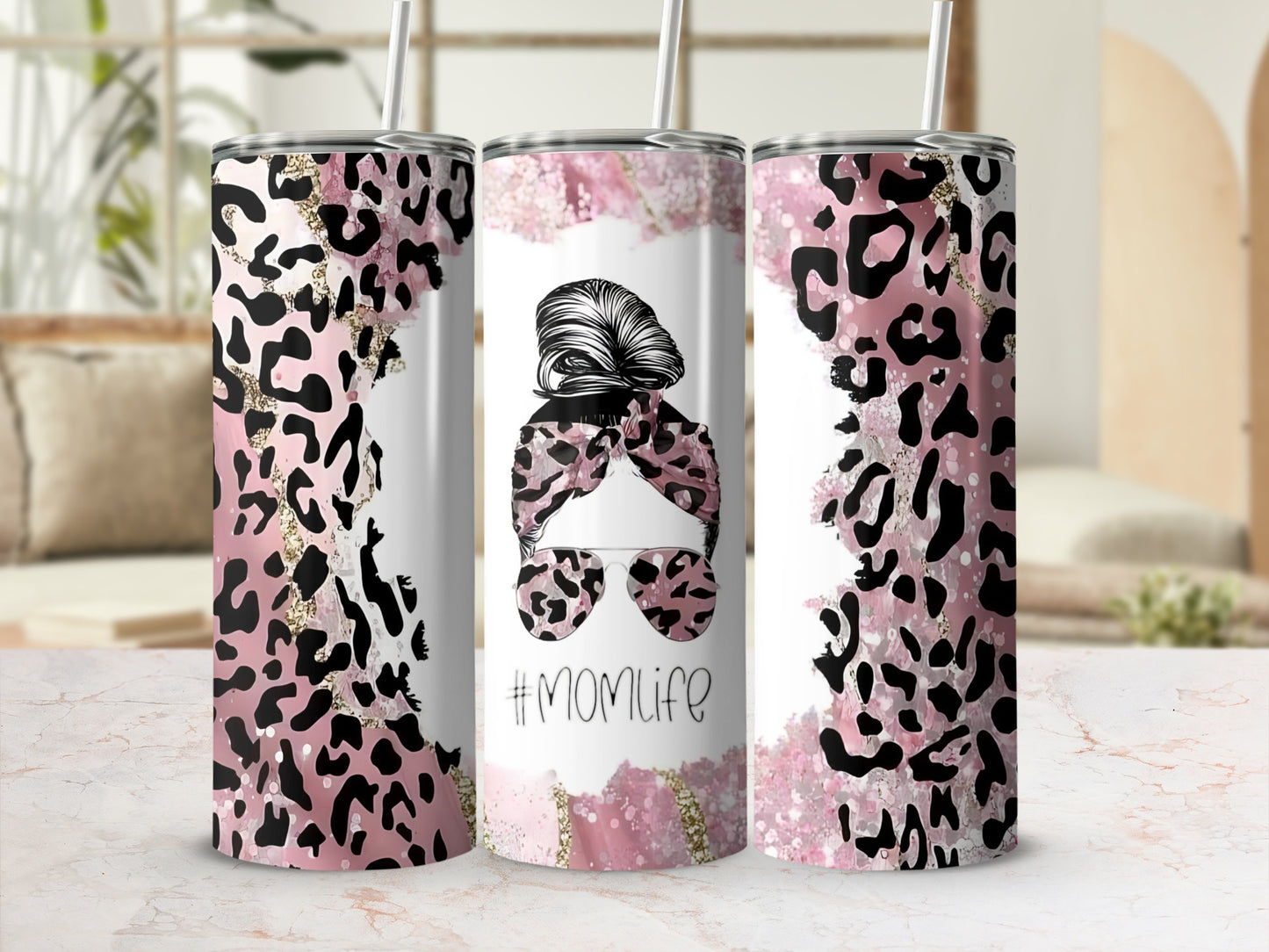 Leopard print tumbler with #Momlife text and glitter accents.