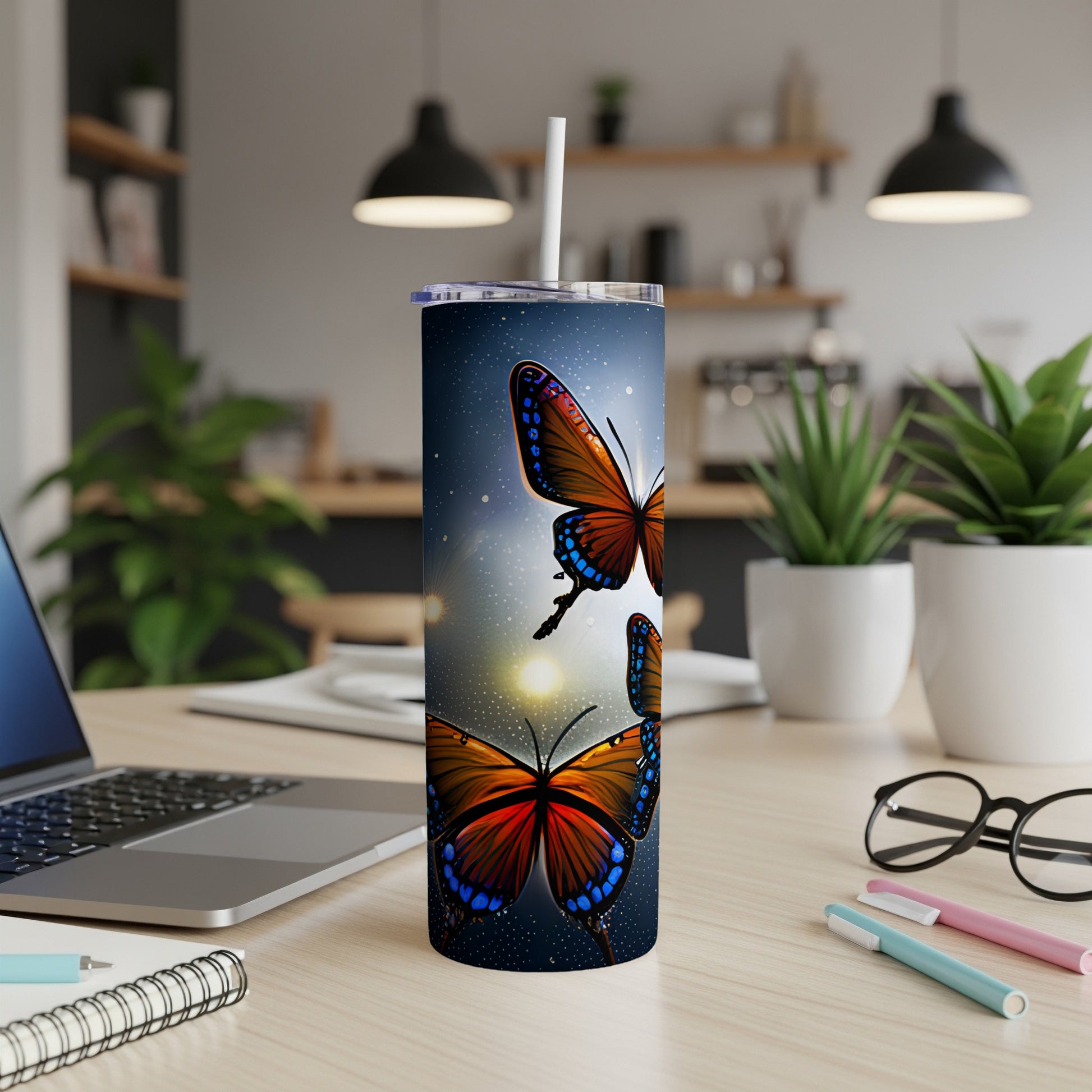Tall tumbler with colorful butterflies and starry background.