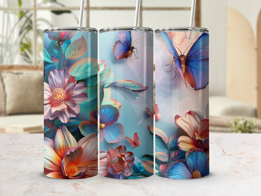 Three tumblers with vibrant floral and butterfly designs.