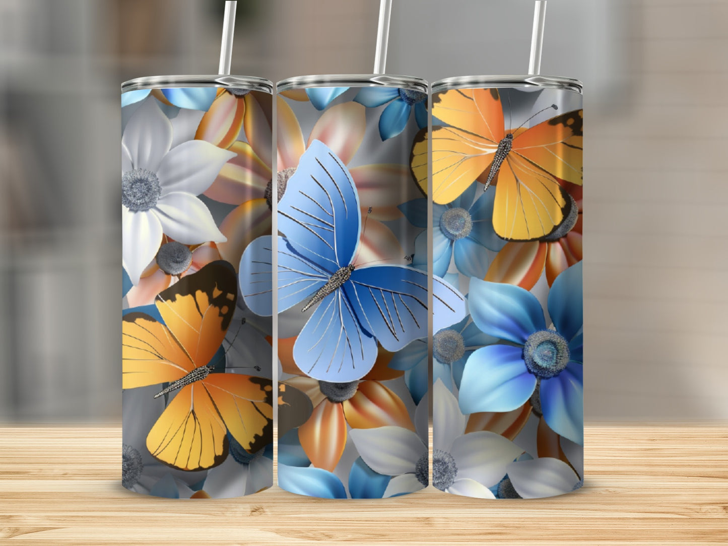 Three tumblers featuring butterflies and floral patterns.