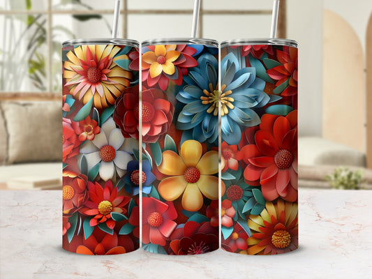 Three tumblers with vibrant, layered floral designs in red, blue, and yellow.