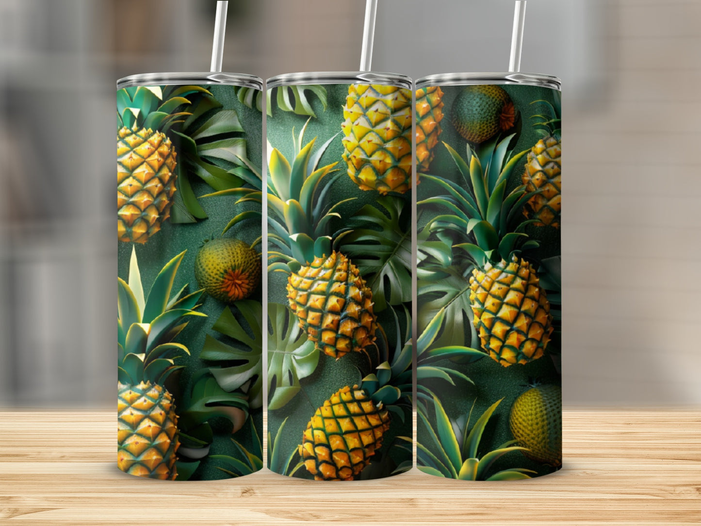 Three tumblers with a tropical pineapple and palm leaf pattern.