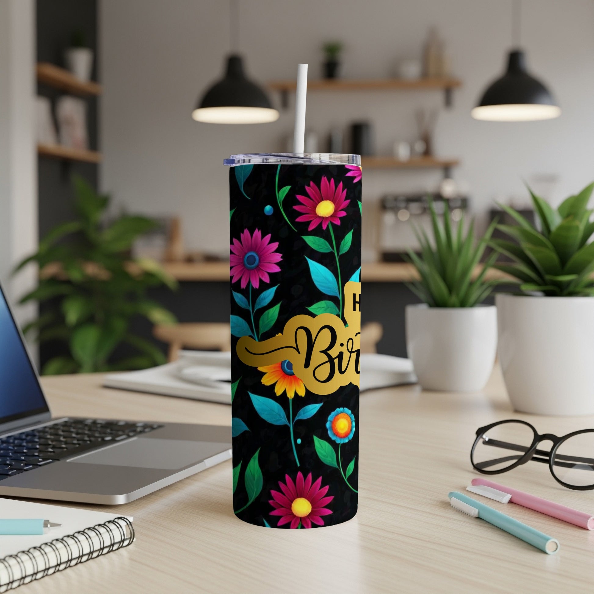 Happy Birthday tumbler with colorful floral and leaf design.