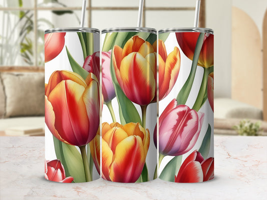 Three tumblers with a close-up floral pattern of red and yellow tulips.