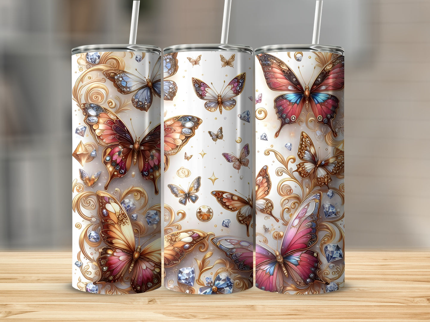 Three tumblers with colorful butterfly and diamond patterns.