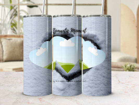 Tumblers with "Romantic Moment" text and cloud hearts on snowy background.