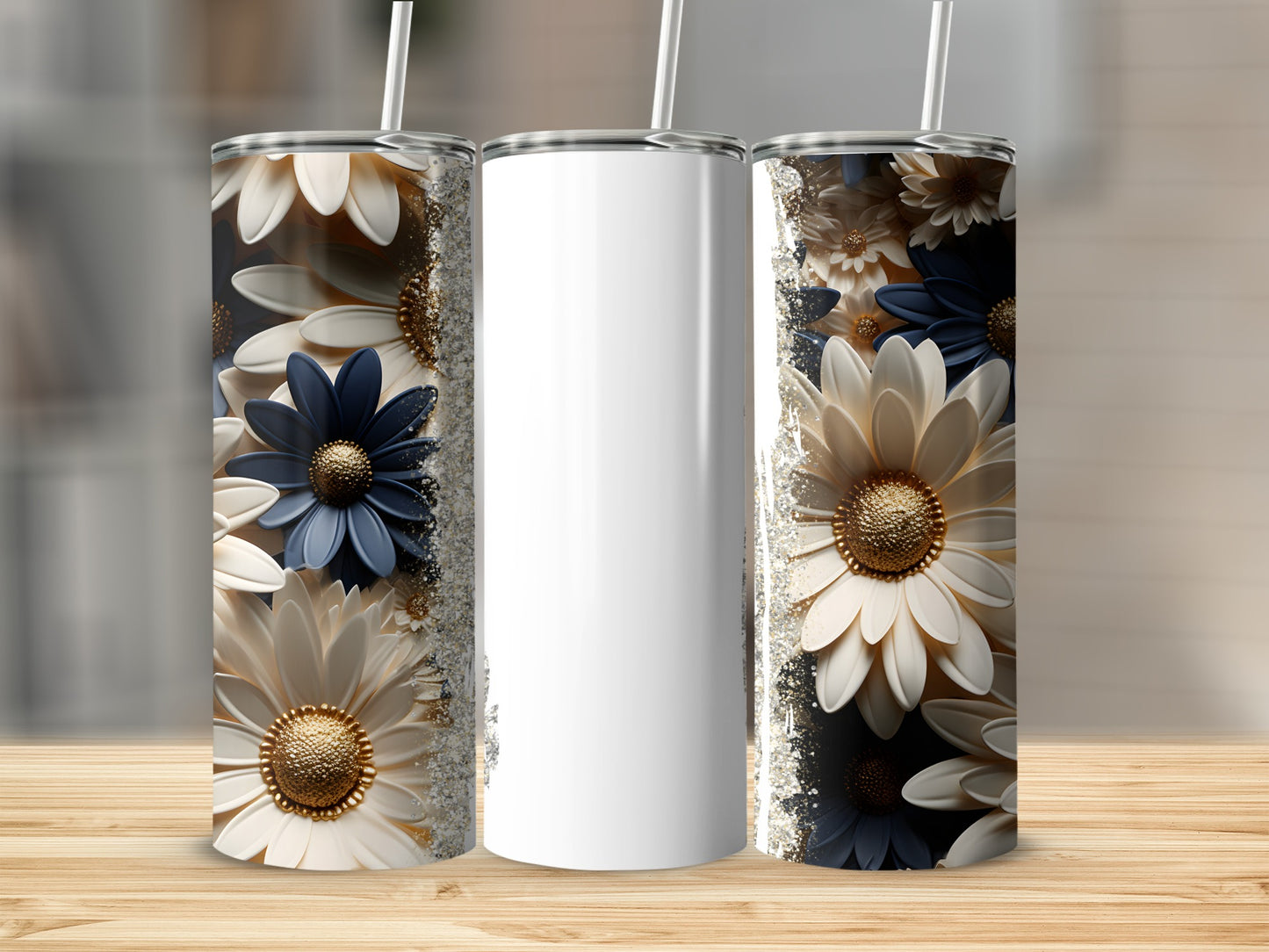 Three tumblers with white, navy, and gold floral designs.