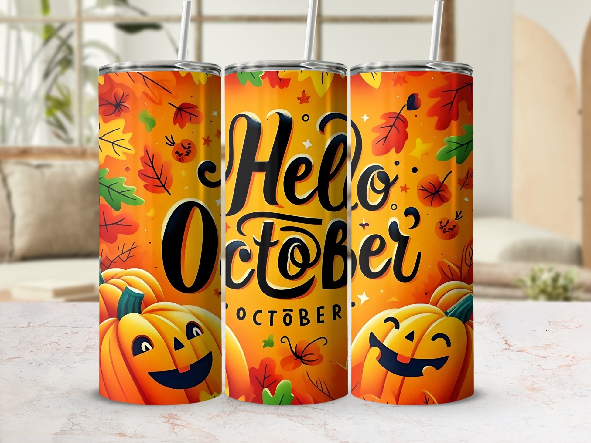 Three tumblers with a "Hello October" design featuring pumpkins and autumn leaves.