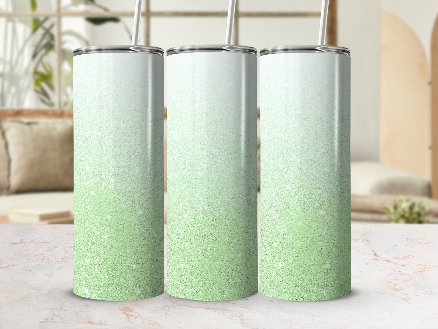 Three glitter tumblers with ombre green and white gradient design.