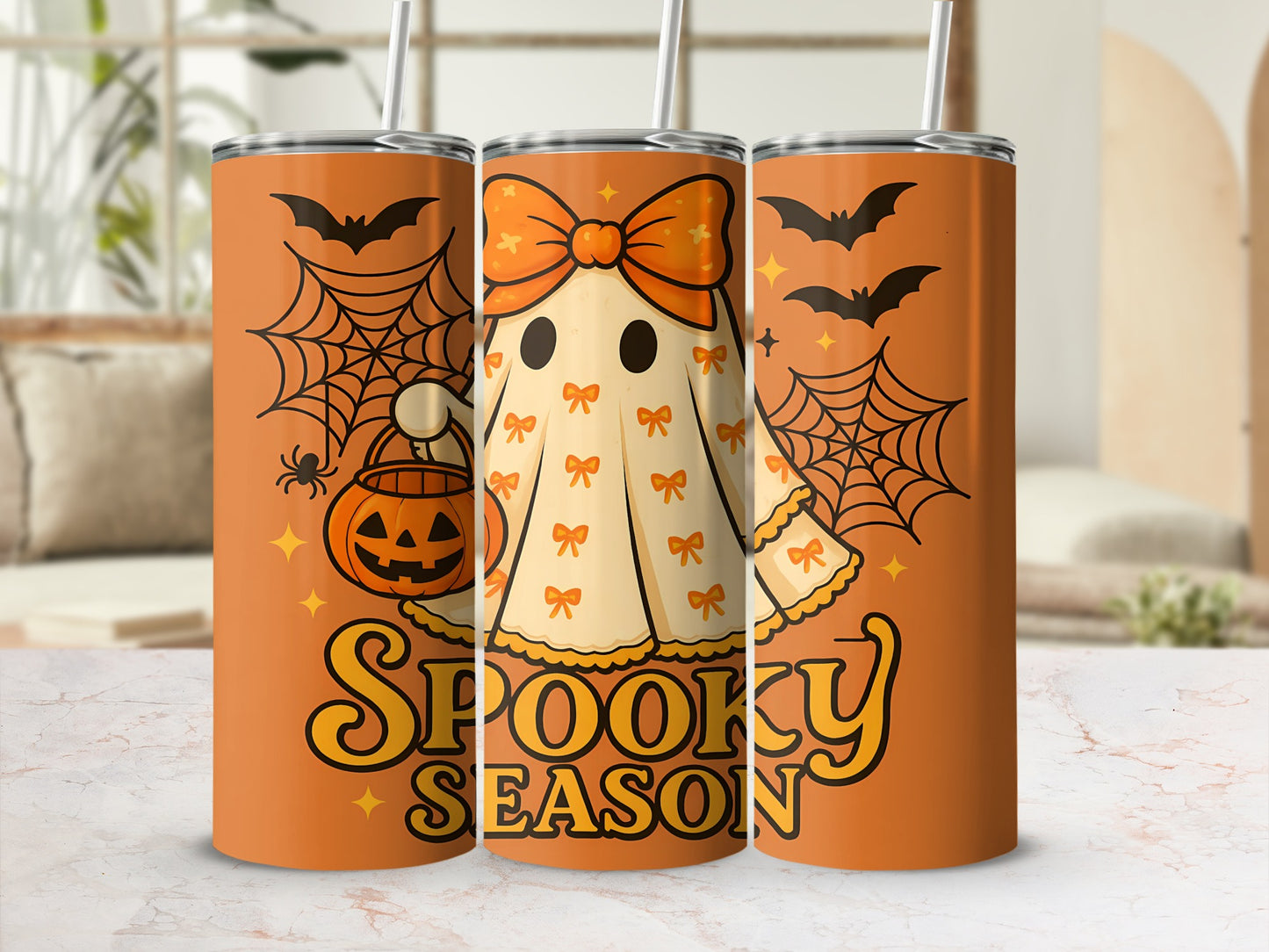 Orange tumblers with cute ghost, pumpkin, bats, and "Spooky Season" text.