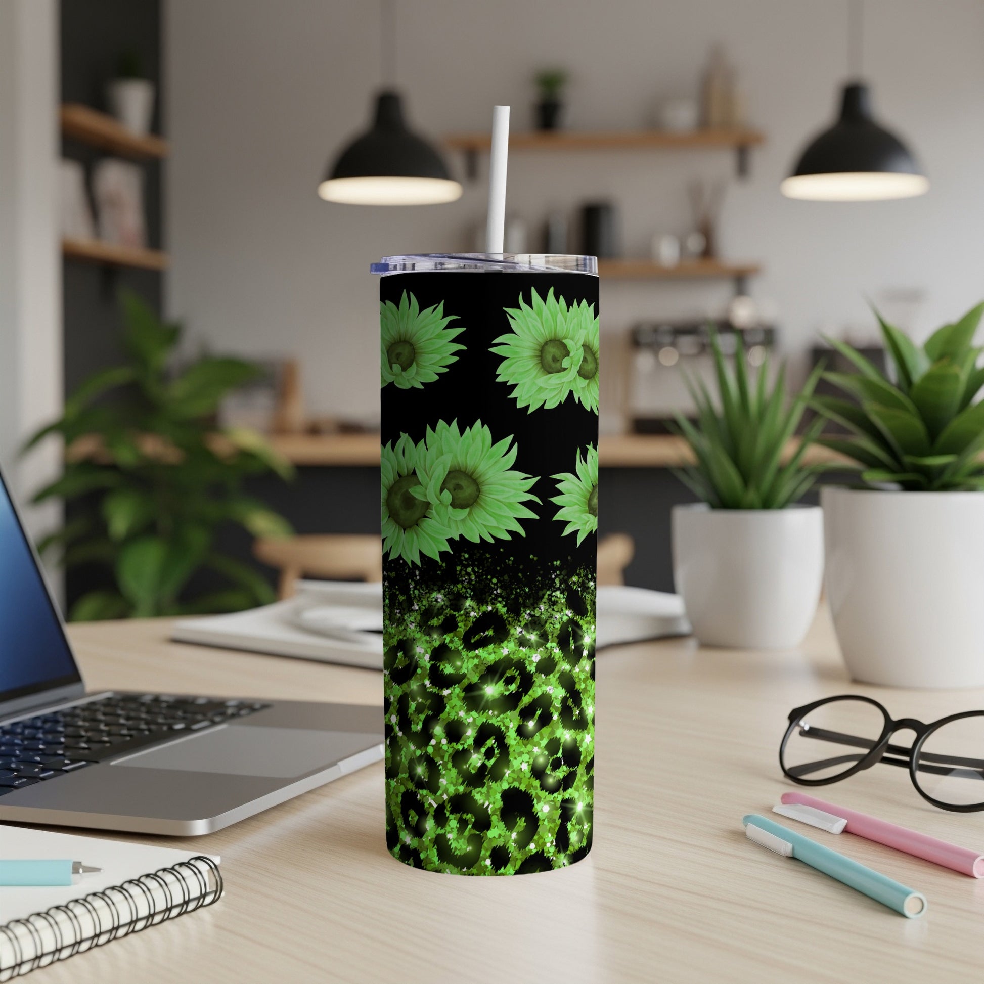 Green glitter leopard print tumbler with sunflowers and white straw.