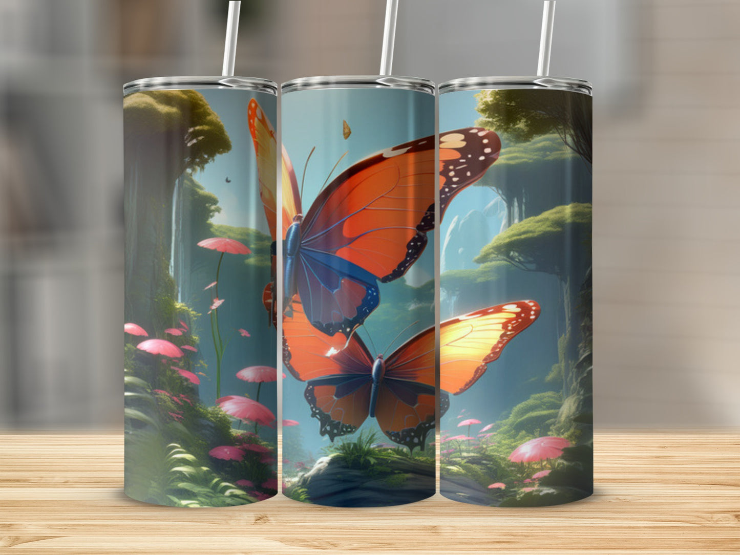 Three tumblers featuring orange butterflies and lush, fantastical scenery.
