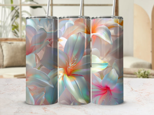 Three tumblers with pastel floral design on marble surface.