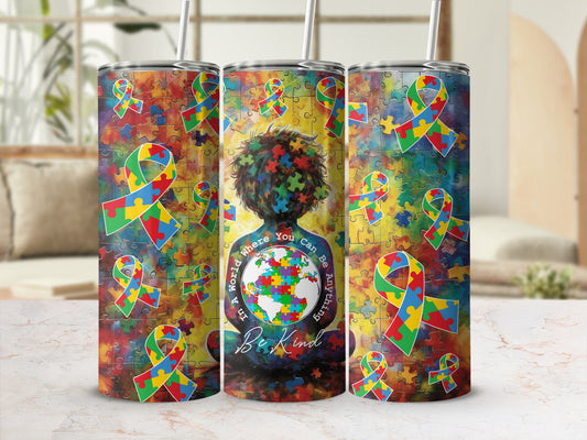 Three puzzle-themed tumblers with autism awareness ribbons and text.
