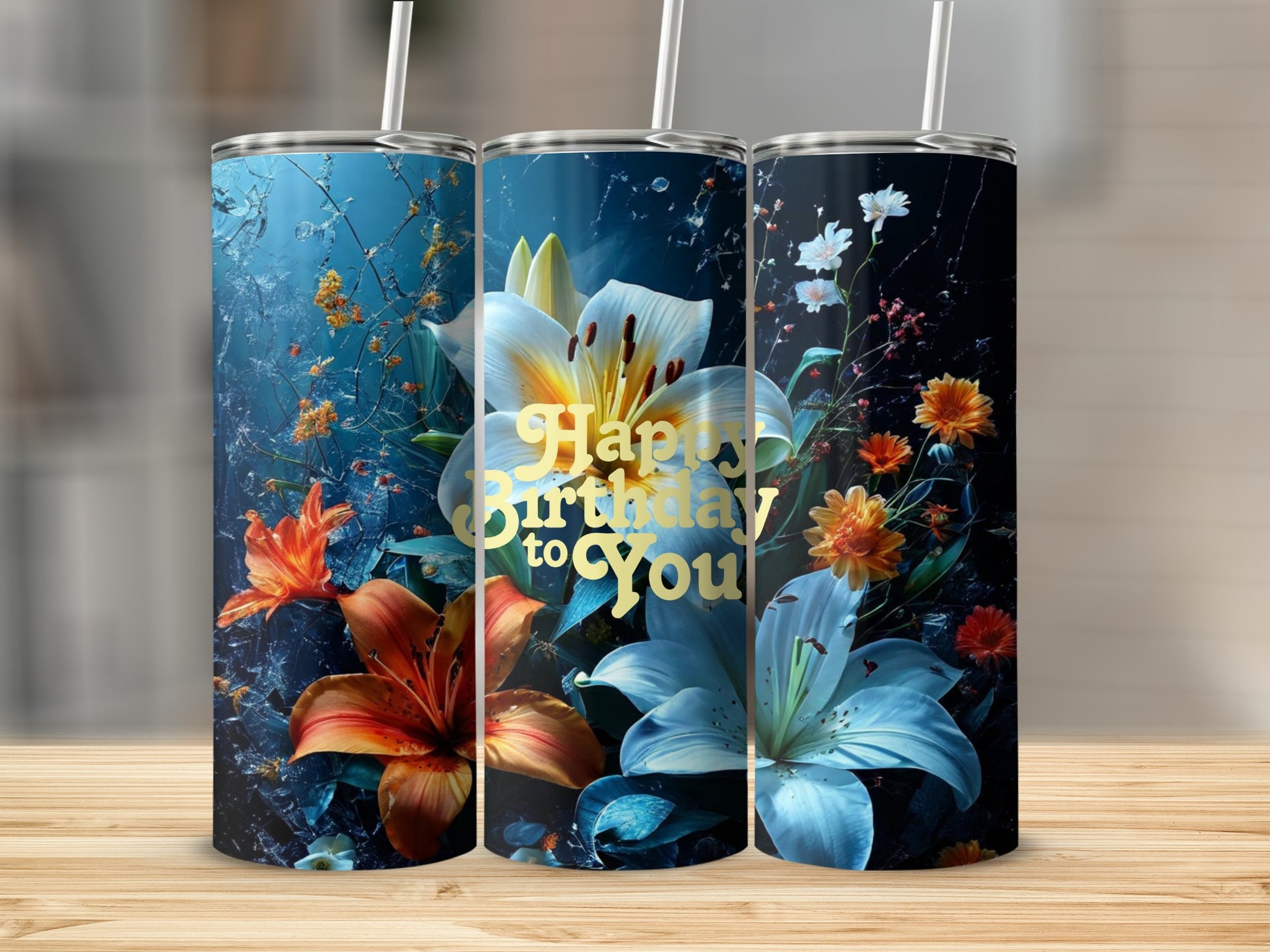 Tumbler with blue floral design and "Happy Birthday to You" text.