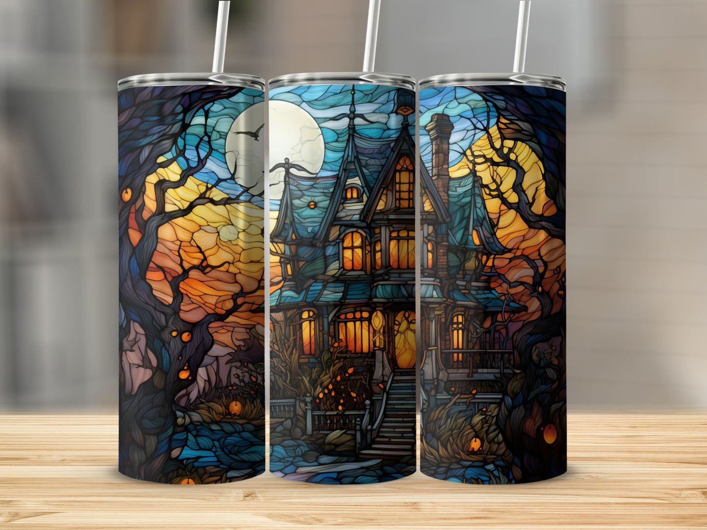 Stained glass tumbler featuring a haunted house and spooky trees under a full moon.