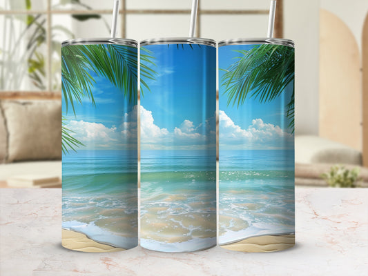 Three tumblers with a beach scene and palm fronds.