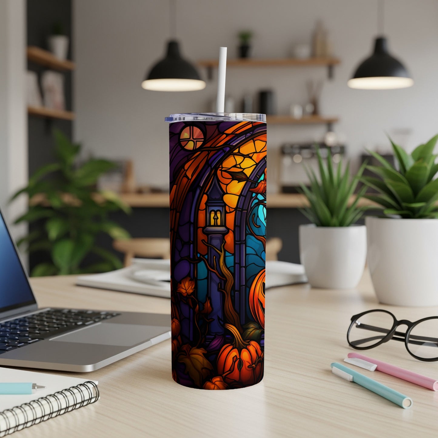 Stained glass tumbler with pumpkins and a spooky archway.