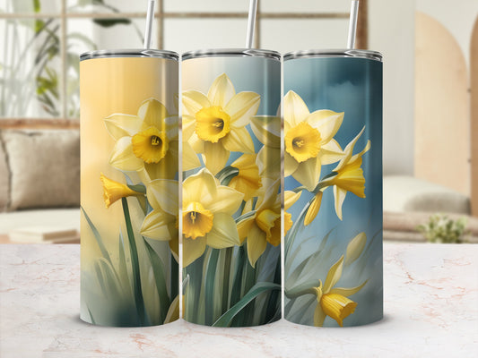 Three tumblers featuring yellow daffodils on a light background.