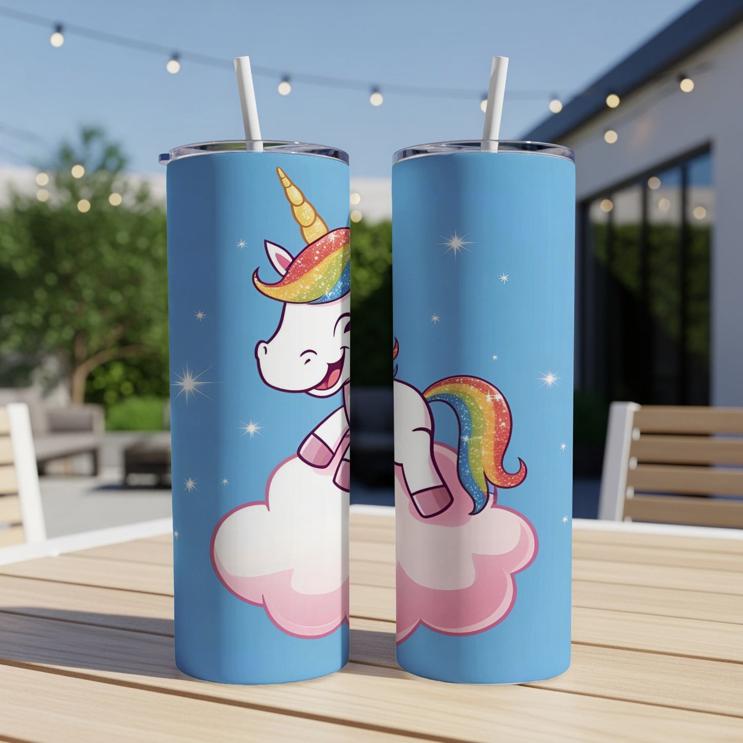 Two blue tumblers with a cartoon unicorn on a pink cloud.