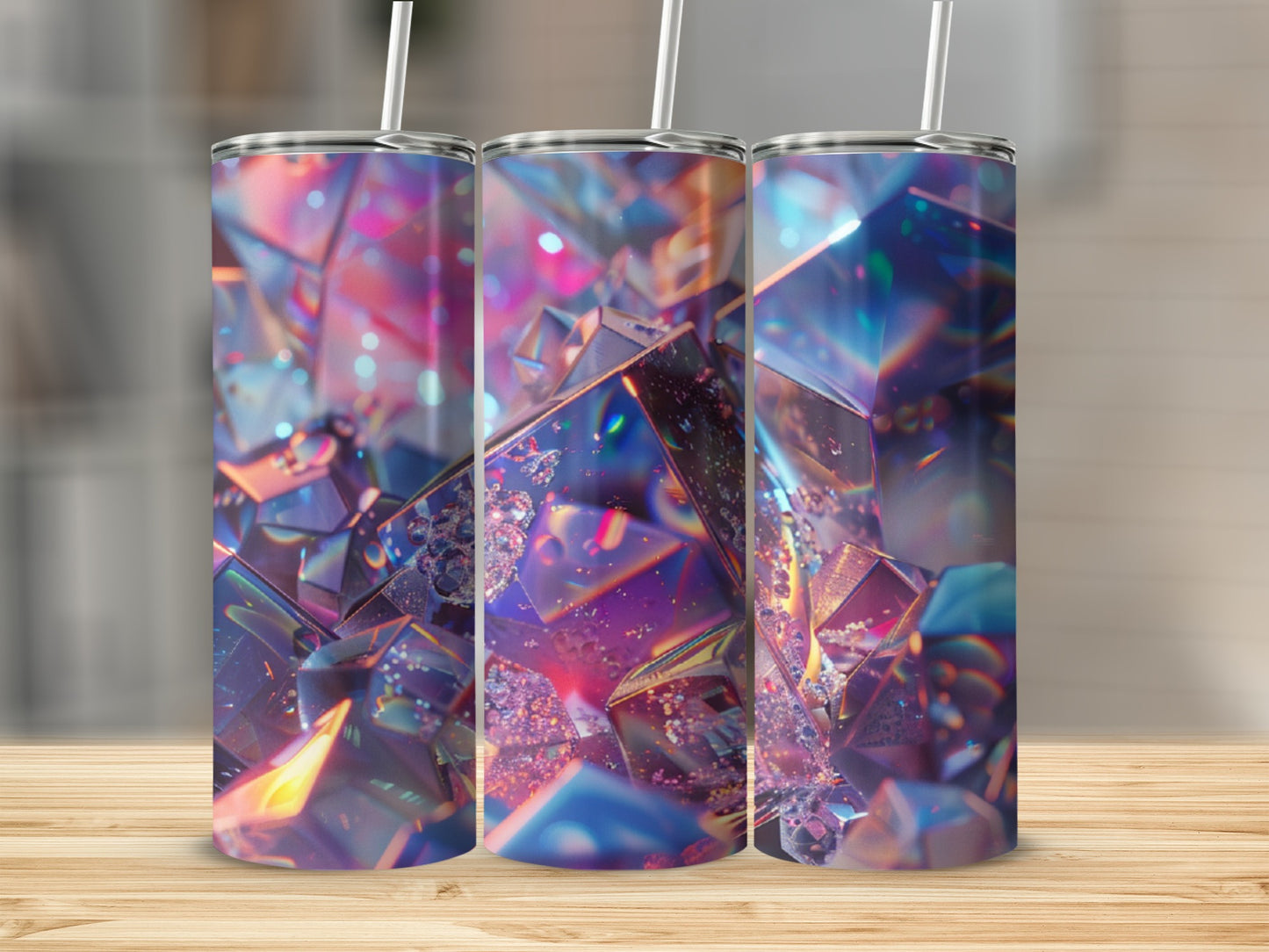 Three tumblers with holographic, crystalline geometric patterns.