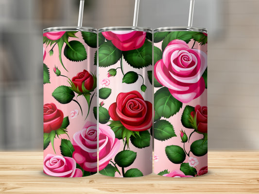 Three pink tumblers with red and pink roses pattern.