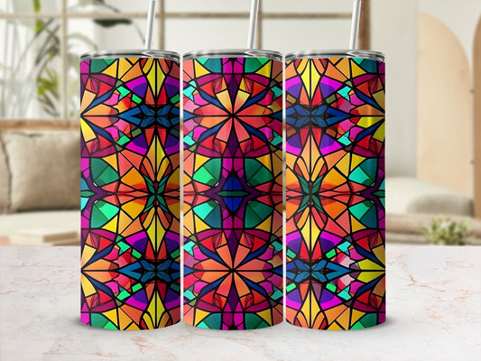 Three tall tumblers with a stained glass-like colorful geometric pattern.
