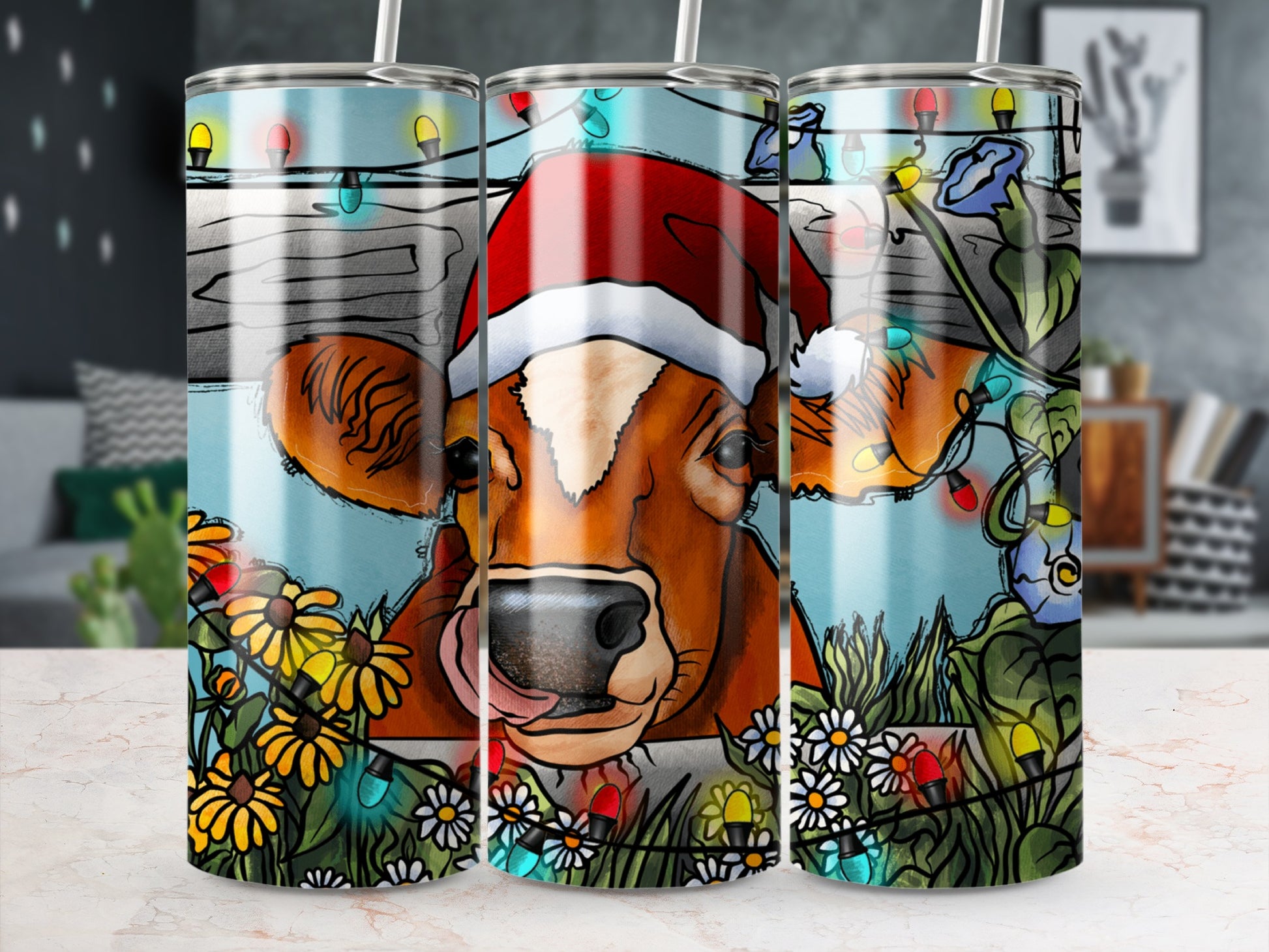 Cow wearing a Santa hat surrounded by festive lights and flowers.