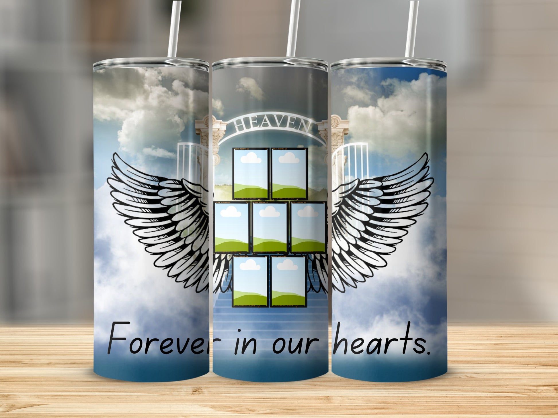 Tumbler with angel wings, heaven gate, and "Forever in our hearts" text.