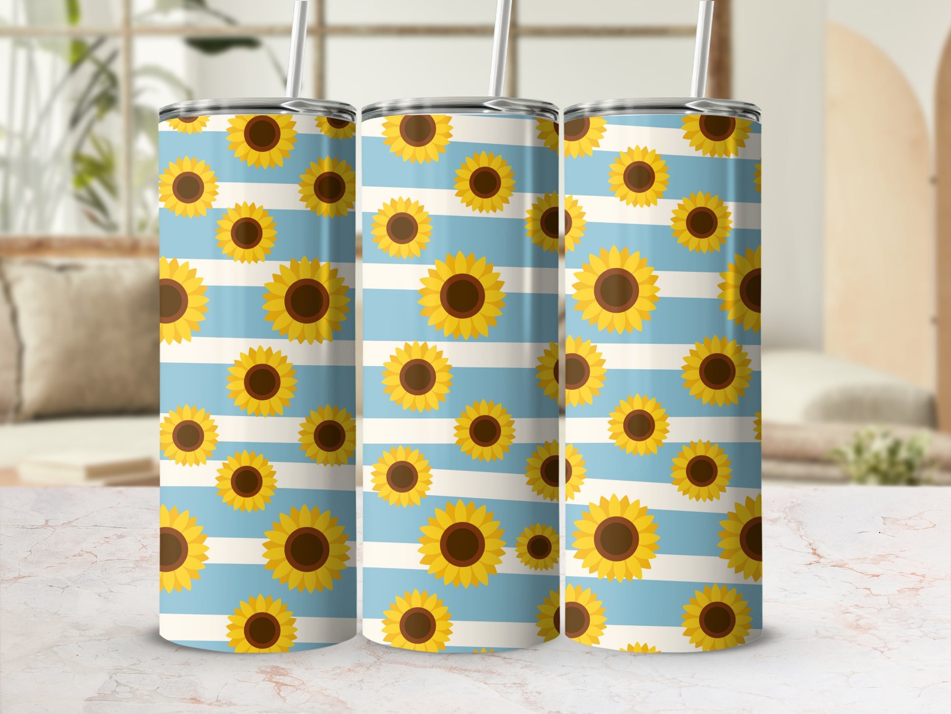 Three tumblers with a blue and white striped sunflower pattern.