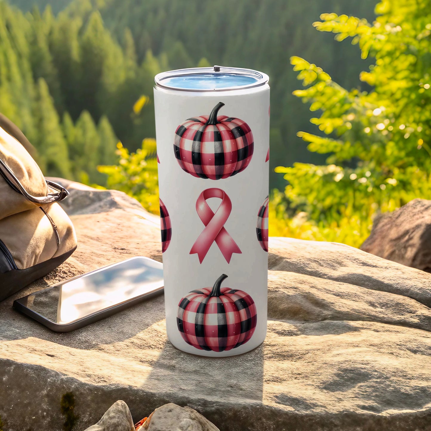 Tumbler with plaid pumpkins and pink ribbon pattern.