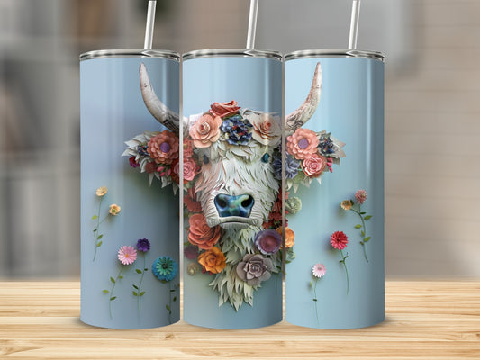 Floral cow portrait on three stacked blue tumblers.