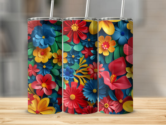 Three tumblers with vibrant floral patterns in red, blue, yellow, and green.