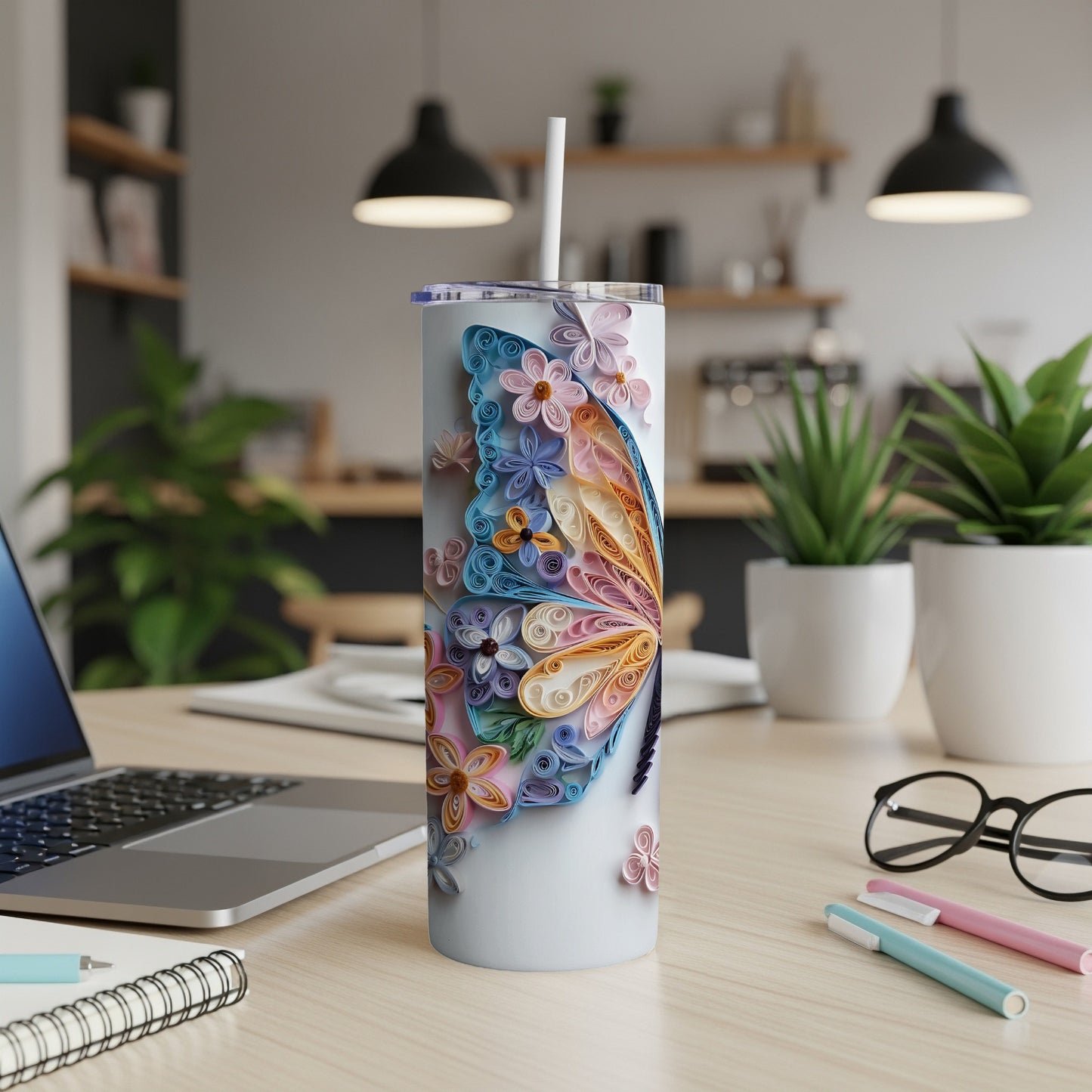 Tumbler with quilled butterfly and floral design, straw included.
