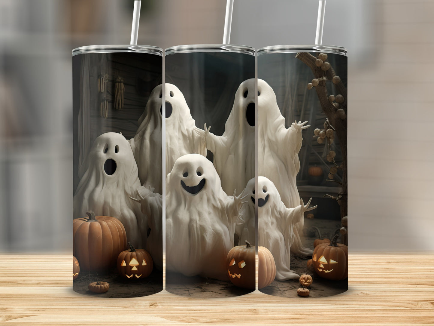 Several cute ghosts surround carved pumpkins on a Halloween-themed tumbler.