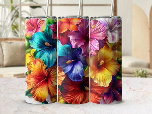 Three tumblers adorned with vibrant, colorful hibiscus flowers.