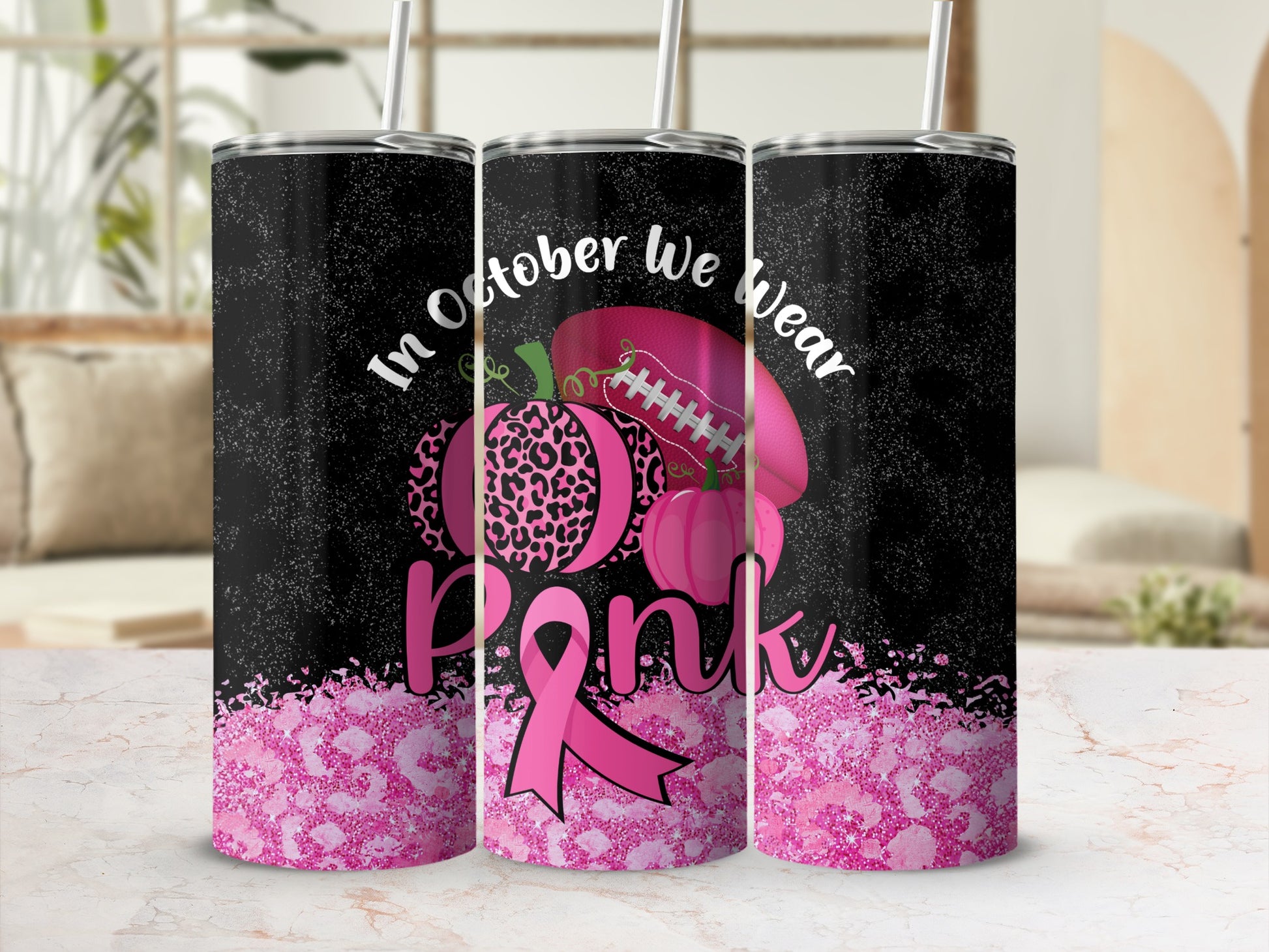 Pink leopard print tumbler with breast cancer awareness ribbon and pumpkins.