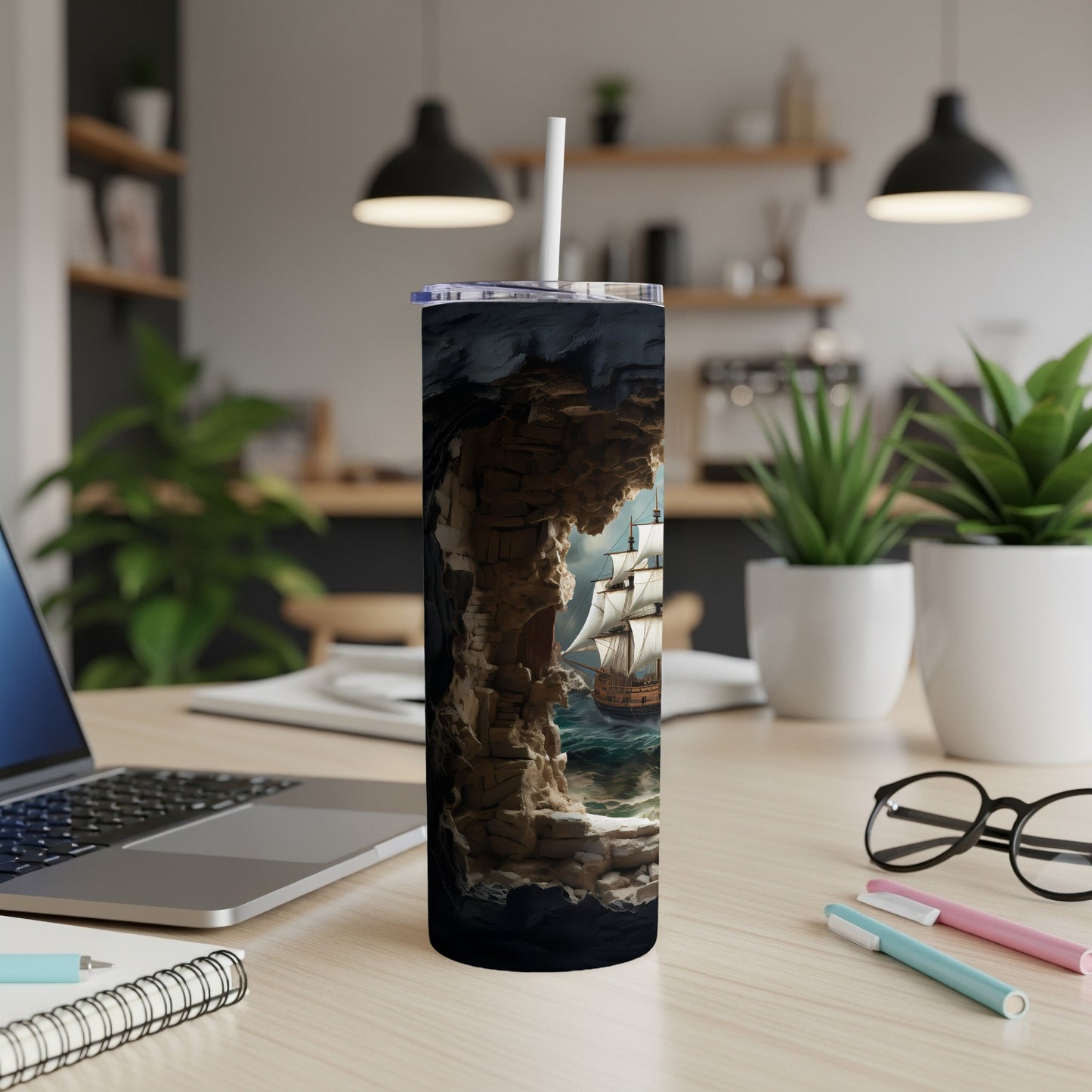 Pirate ship sailing out of a rocky cave opening on a tumbler.