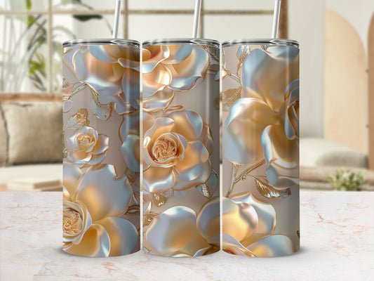 Three tall tumblers with embossed golden roses on a marble surface.