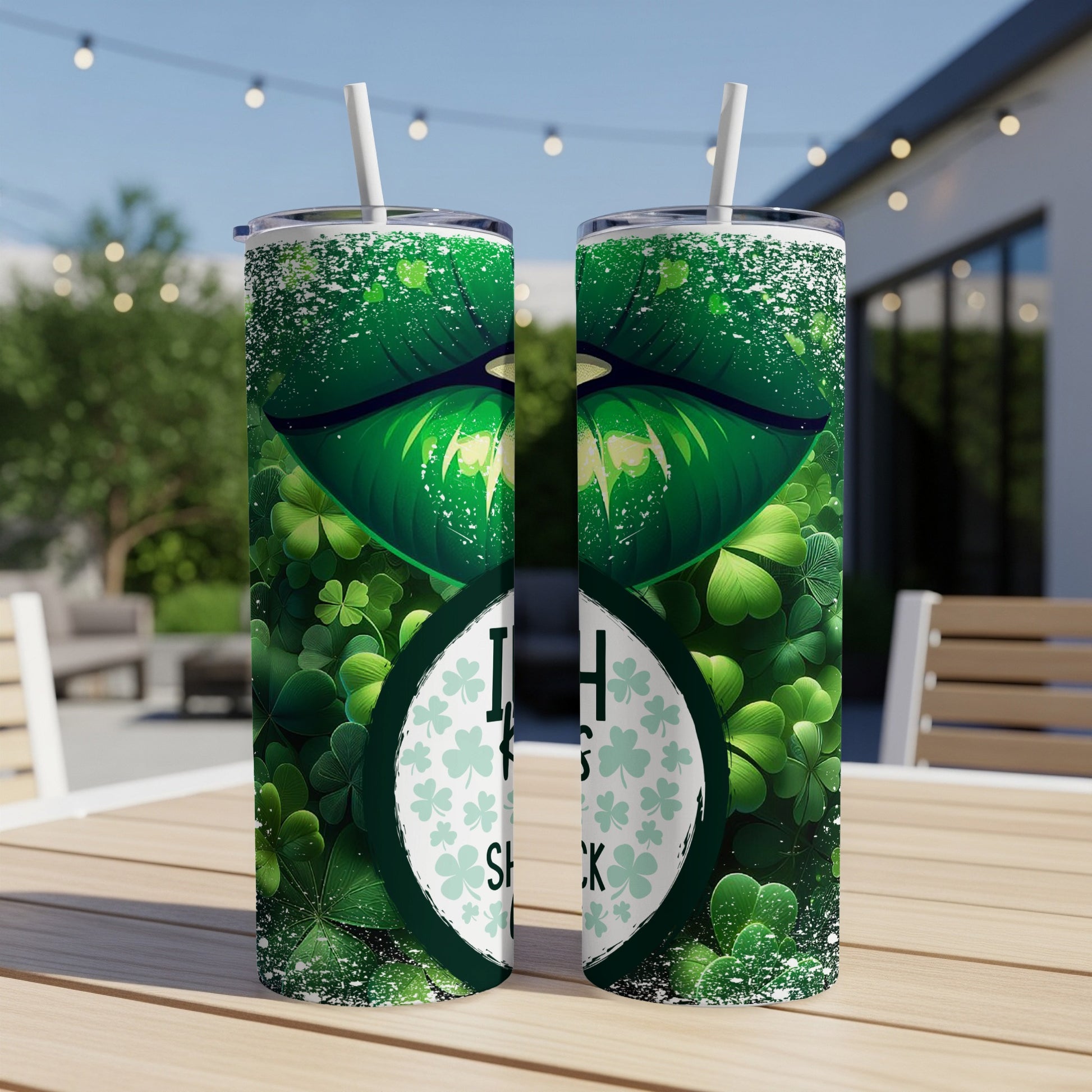 Green lips and shamrocks on a tumbler.