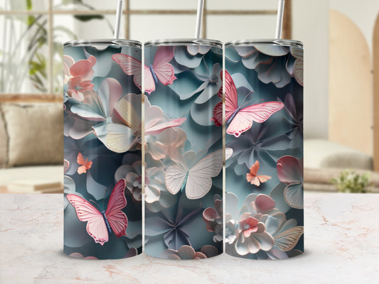 Floral and butterfly pattern on a set of three tumblers.