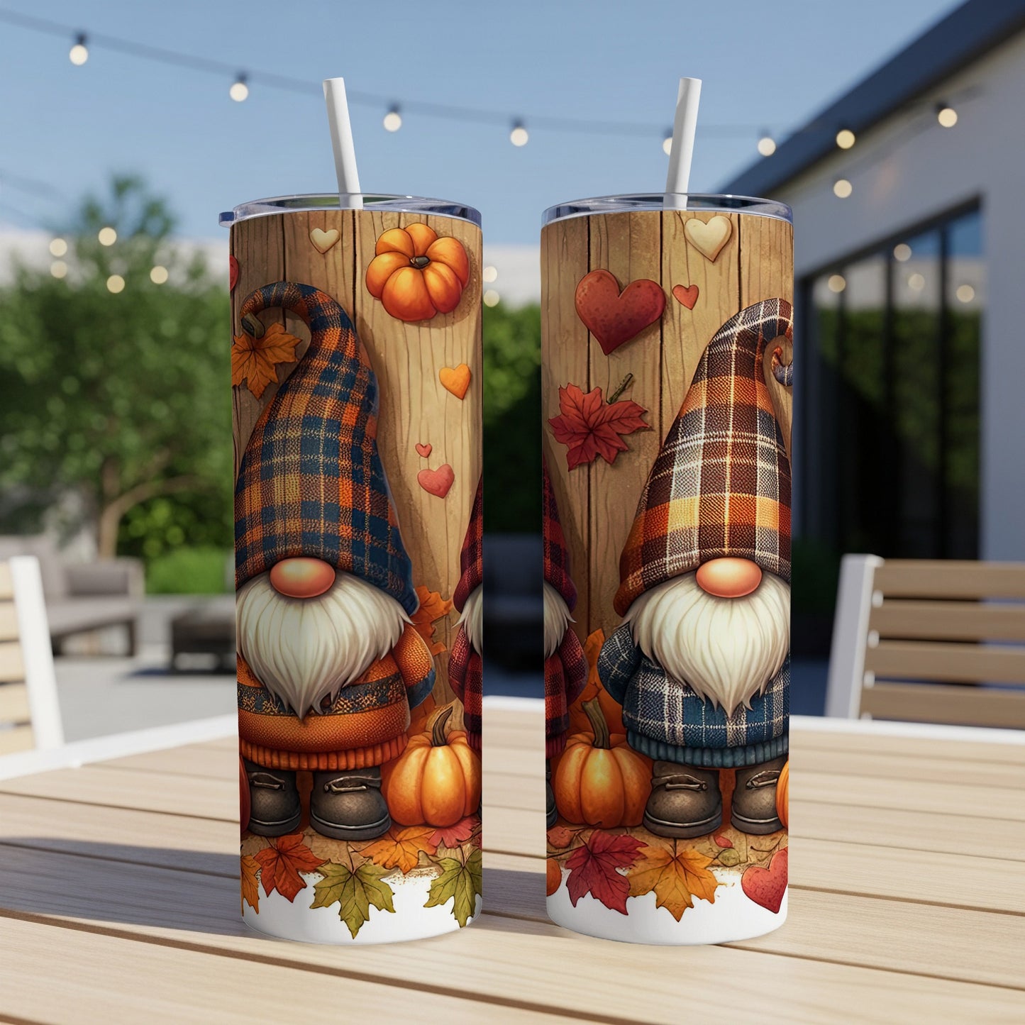 Two fall-themed tumblers featuring gnomes, pumpkins, and leaves.