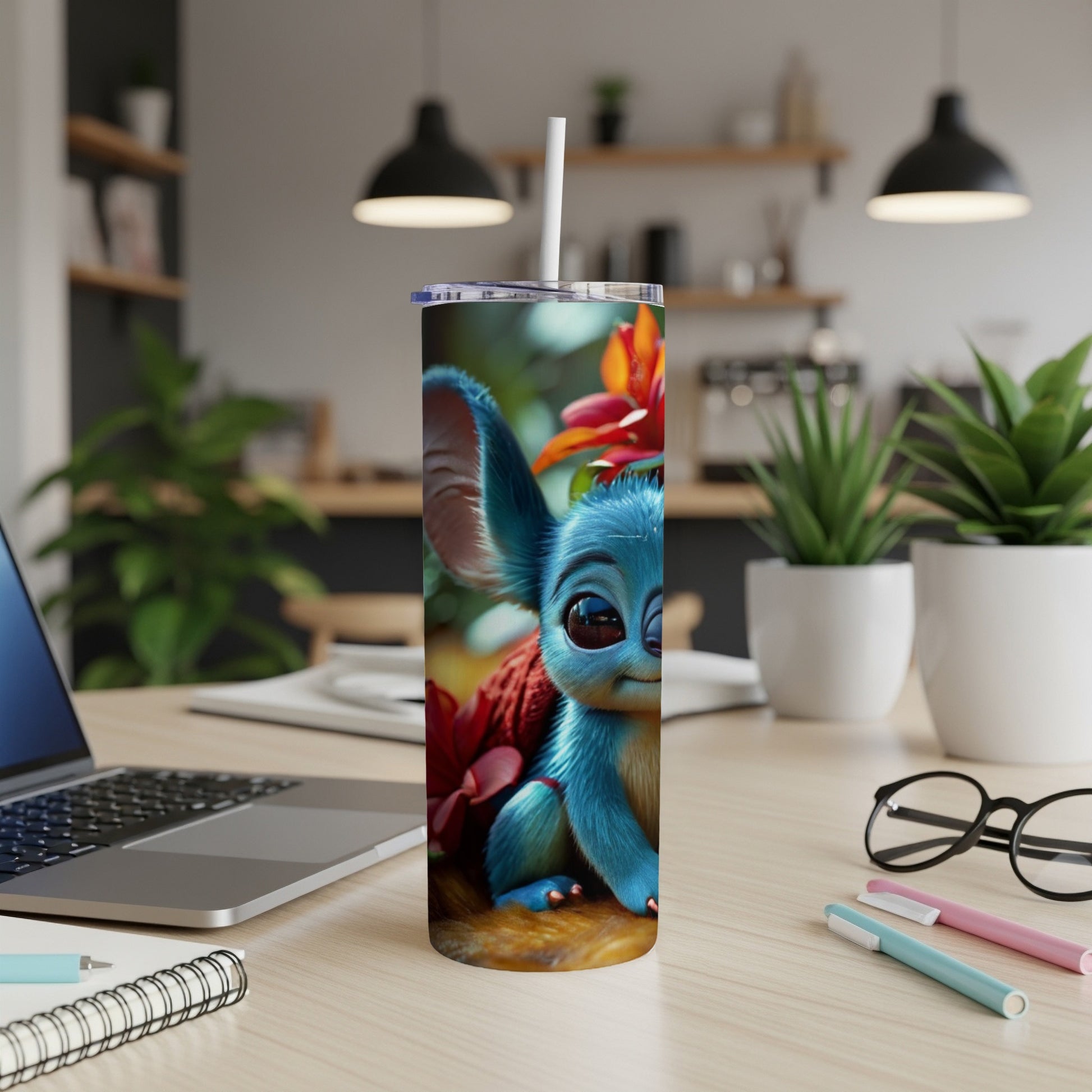 Blue alien character with large ears on a travel tumbler.