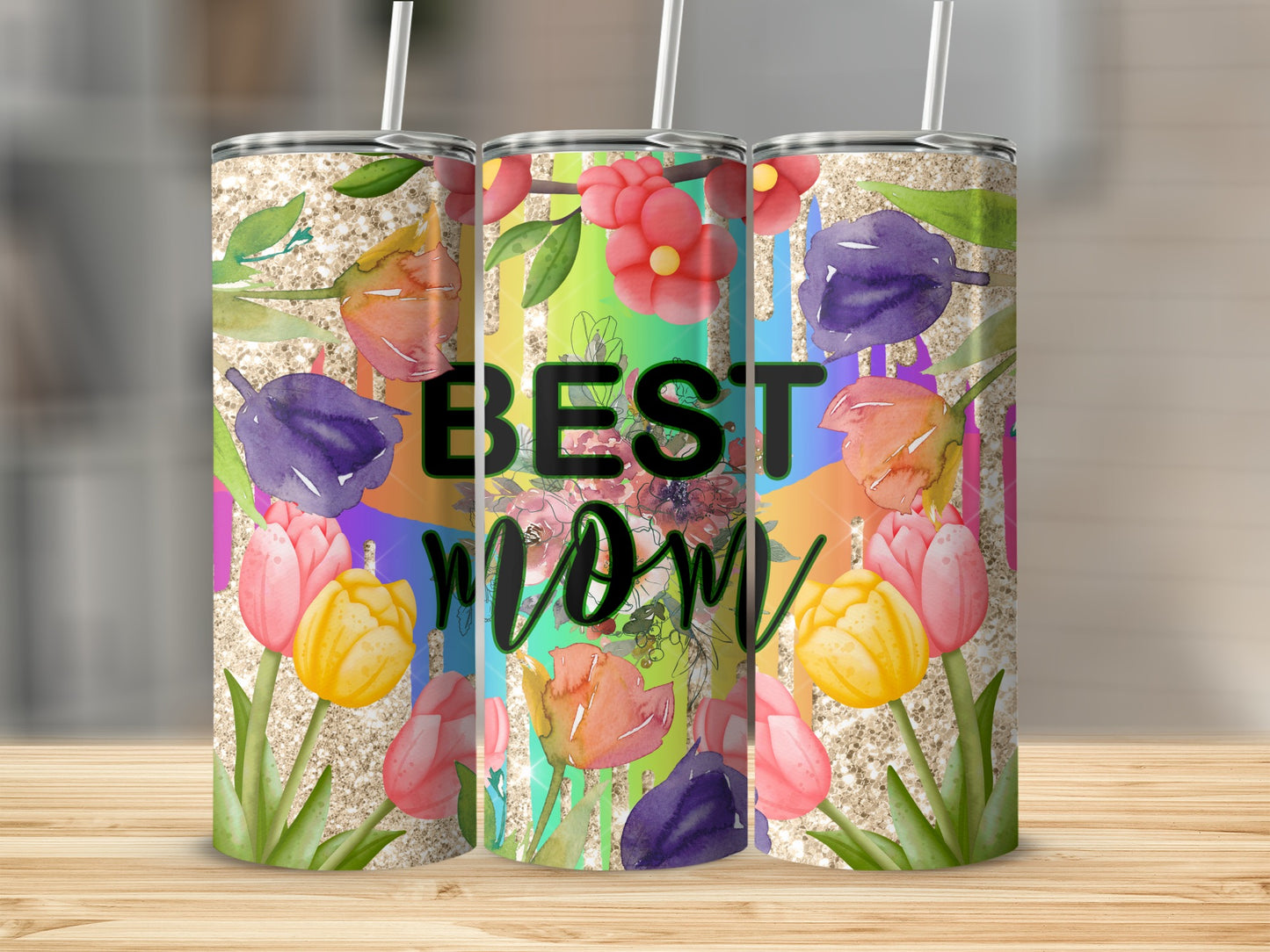 Glitter tumbler with "Best Mom" and colorful floral watercolor design.