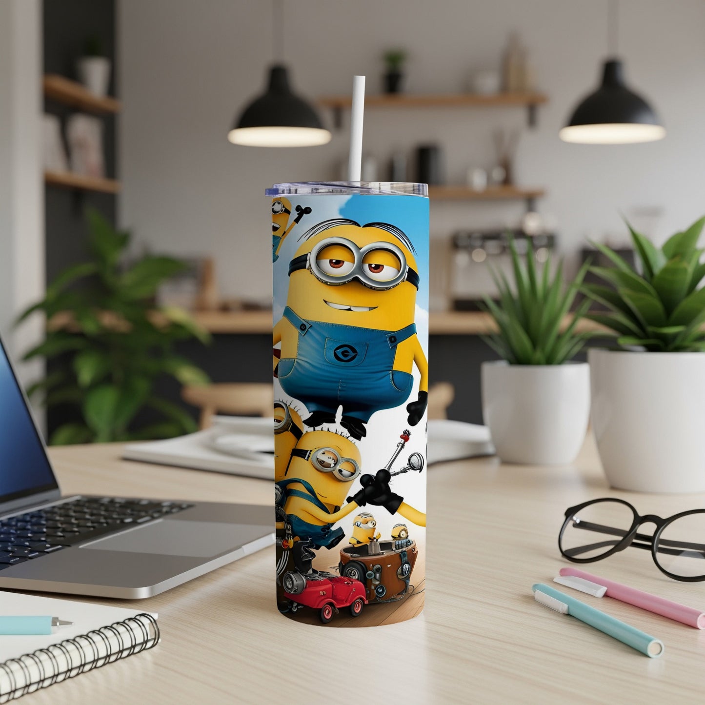 Minions Stuart and Dave on a blue tumbler with a straw.