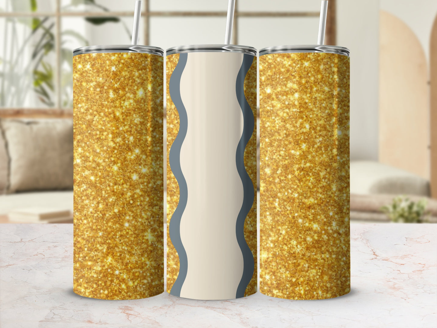 Three glittery tumblers with wavy design in the center.