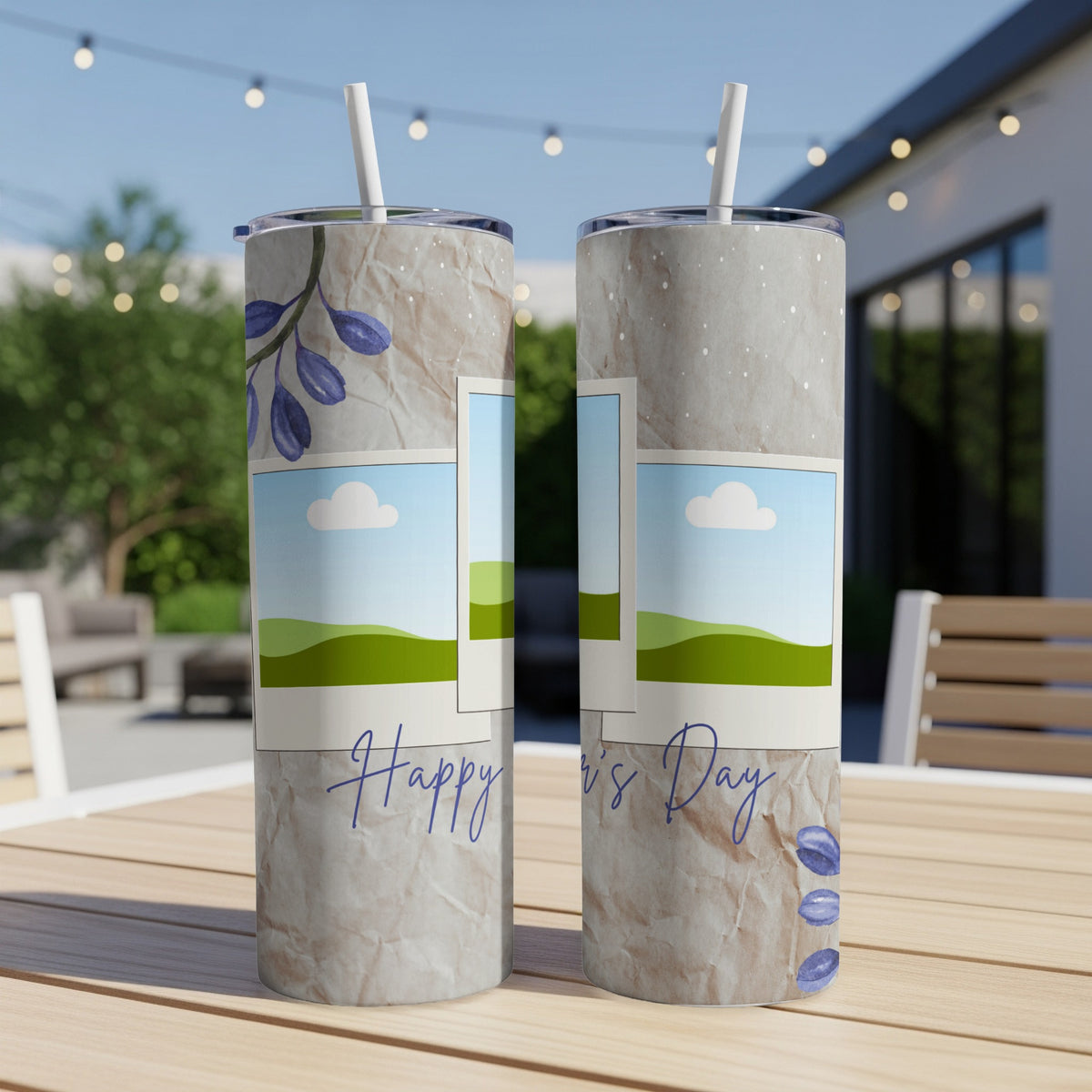 Two tumblers with "Happy Father's Day" text and floral accents on a wooden table.