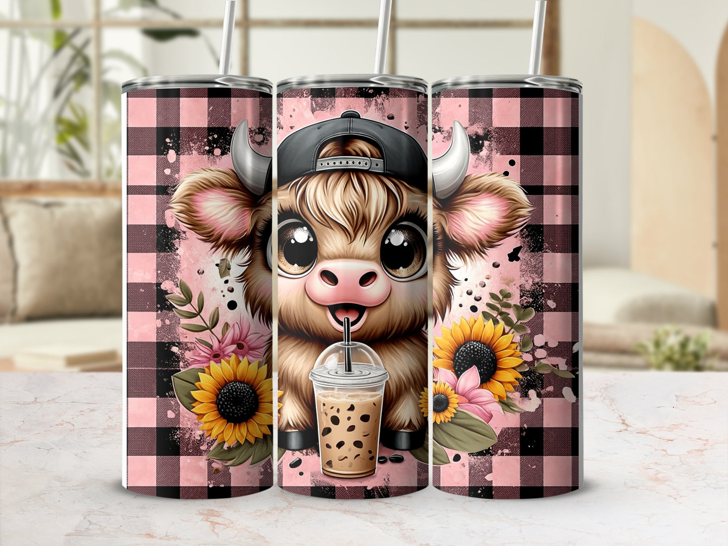 Cow with bubble tea and sunflowers on pink buffalo plaid background.
