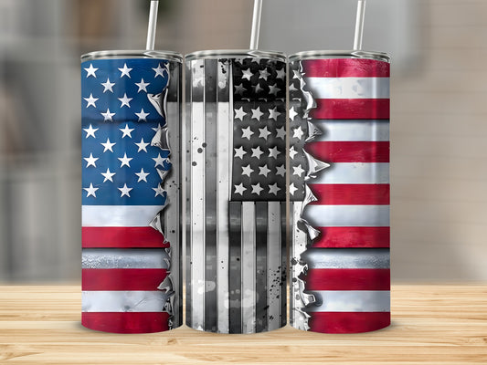 Three US flag tumblers with distressed patriotic designs on a wooden surface.